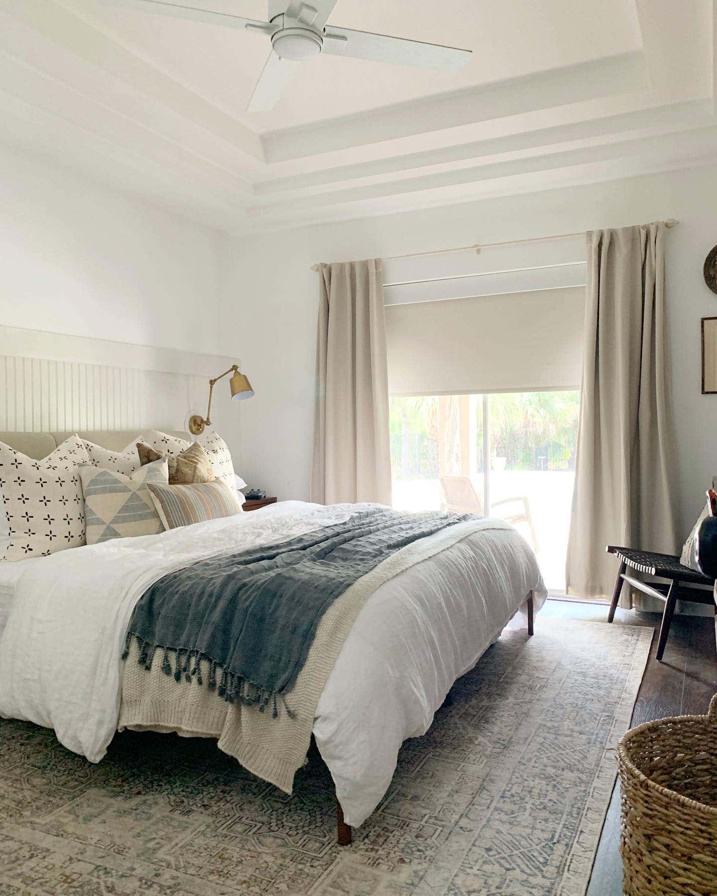 Bedroom with Blackout Fabric Roller Shades in Linen