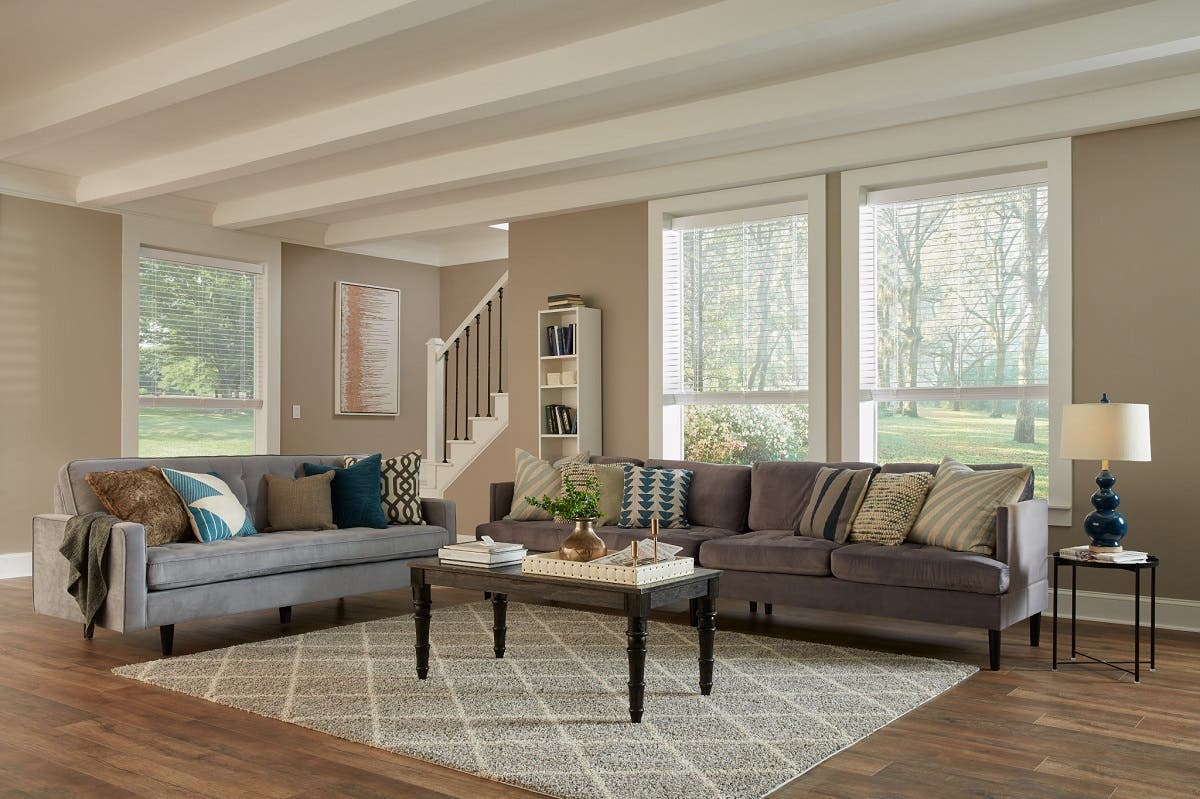 First floor living room with opened motorized wood blinds