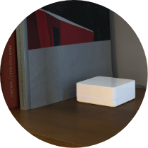 Smart Hub sitting on a bookcase
